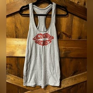 Victoria’s Secret grey tank. XS-loose fit. Could fit S & M as well.